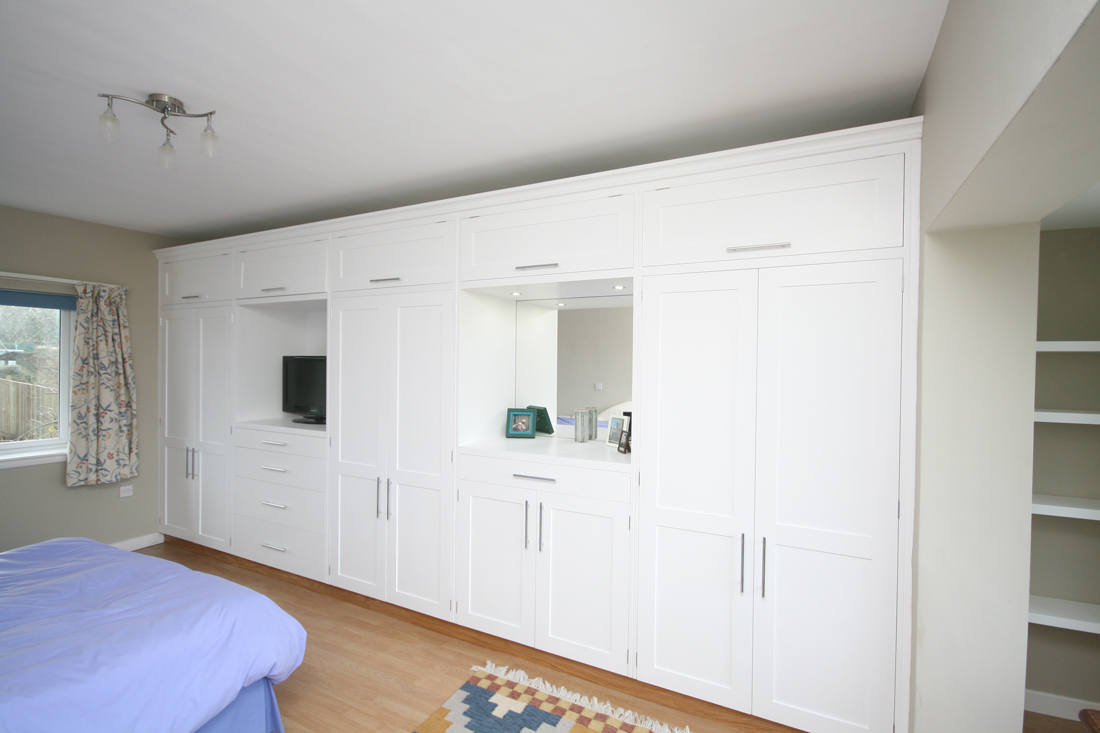 Back to Rank of Wall to Wall Wardrobes with Mirror and TV alcoves main page