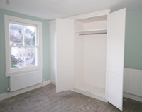 Twin Bespoke Fitted Wardrobes showing Full Height Hanging Space, Click for Enlargement 3 (0.6 mb.)