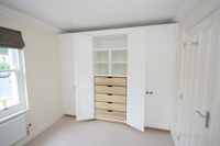 Wall to Wall Fitted Wardrobes with internal Drawers and Pigeon Holes, Click for Enlargements, two pictures (0.6 mb each).