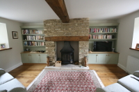 Alcove Units with Bookshelves Cupboards, Oak Worktop and TV surrounding fireplace in Gloucestershire. Click for Enlargement 3 (0.6 mb)