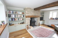 Alcove Units with Bookshelves Cupboards, Oak Worktop and TV surrounding fireplace in Gloucestershire. Click for Enlargement 4 (0.6 mb)