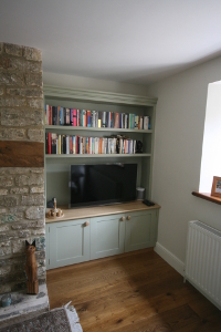 Alcove Units with Bookshelves Cupboards, Oak Worktop and TV surrounding fireplace in Gloucestershire. Click for Enlargement 5 (0.6 mb)